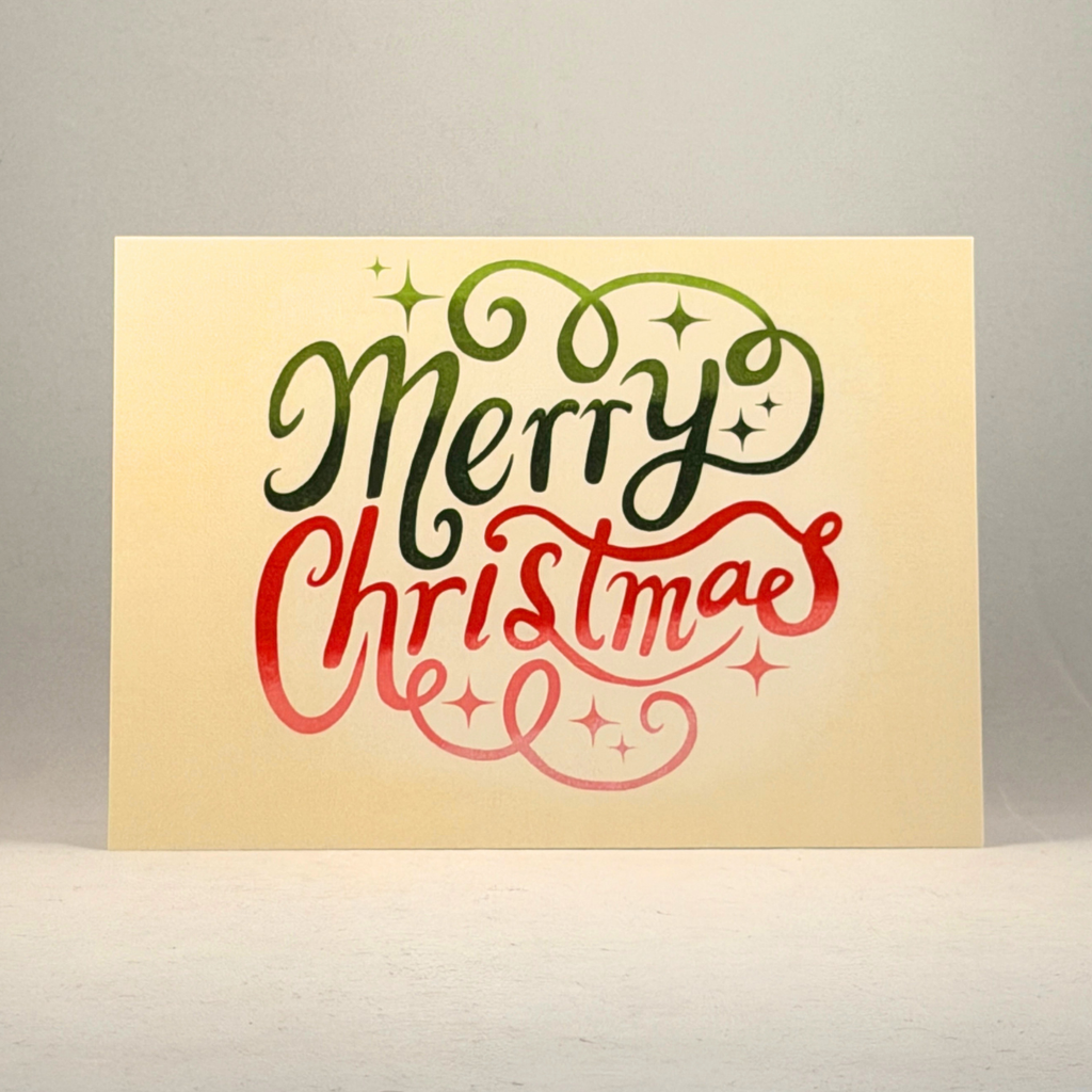 A 5x7 greeting card with a cream-colored background featuring the words 'Merry Christmas' in decorative script. 'Merry' is written in dark green with a gradient effect, and 'Christmas' is written in red with a matching gradient.
