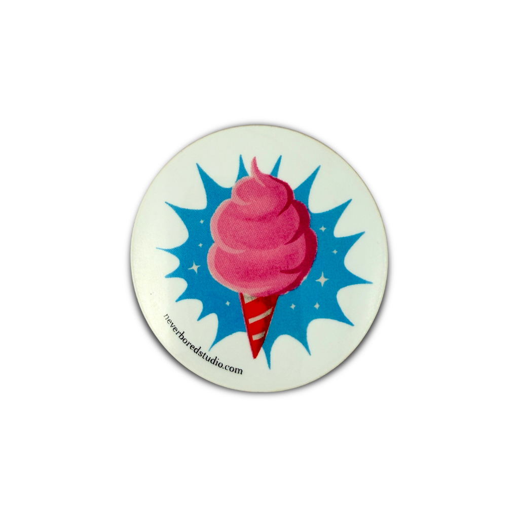 A die-cut featuring a retro-style illustration of a pink cotton candy swirl on a red-and-white striped cone, set against a blue starburst background with small white stars. 