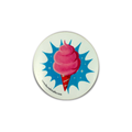 A die-cut featuring a retro-style illustration of a pink cotton candy swirl on a red-and-white striped cone, set against a blue starburst background with small white stars. 